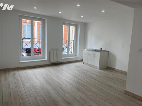 L AIGLE - immeuble commerce et appartement