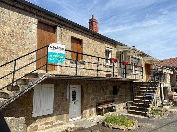 Ensemble de 3 logements avec dépendances, garage et terrain dans centre ville de Lapte