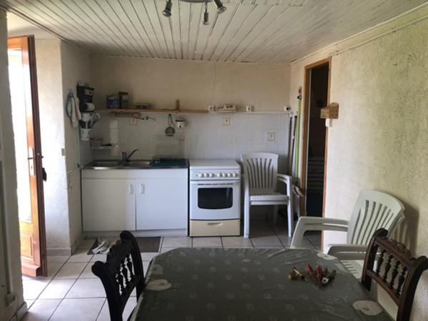 Ensemble de 3 logements avec dépendances, garage et terrain dans centre ville de Lapte
