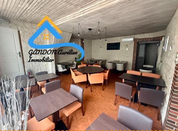 Immeuble avec restaurant et cuisine et chambres d'hotes