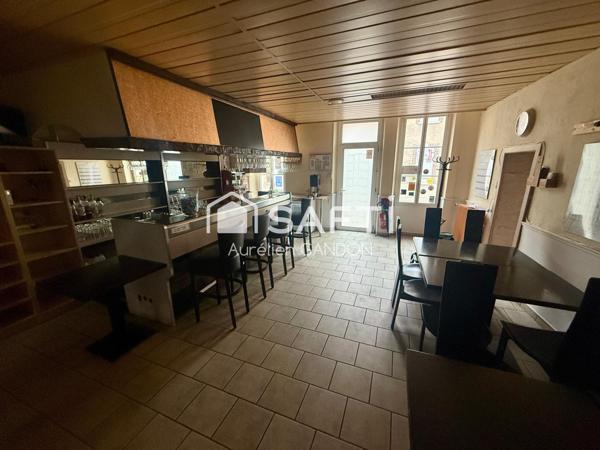 Immeuble avec restaurant et cuisine et chambres d'hotes