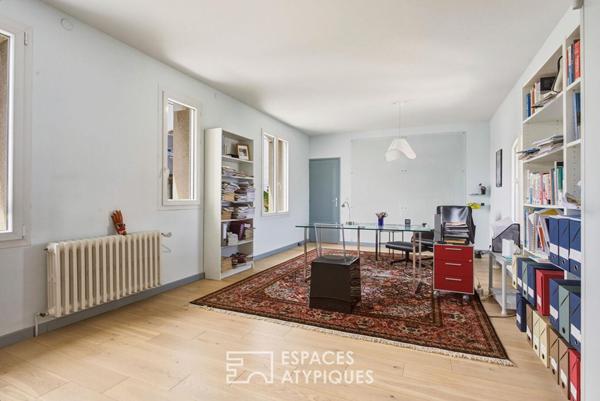 Maison de ville aux volumes remarquables et son jardin