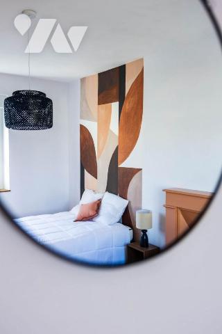 Maison divisée en  6 chambres d'étudiants