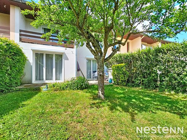 Pavillon années 70 avec jardin, terrasse et garage motorisé