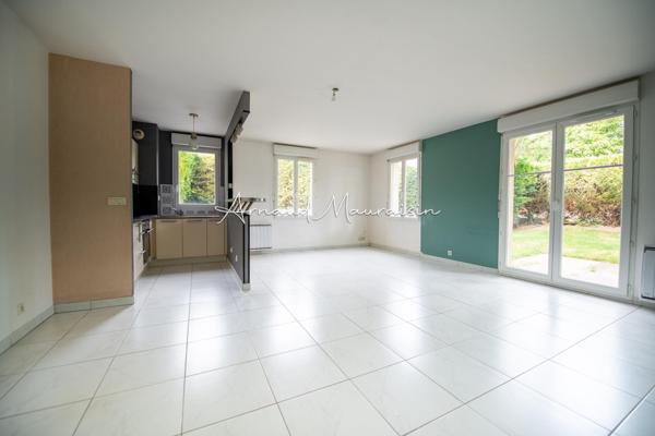 Appartement F3 en rez-de-chaussée avec jardin