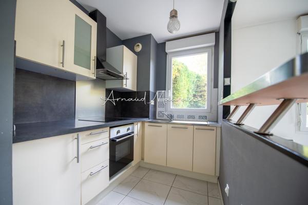 Appartement F3 en rez-de-chaussée avec jardin