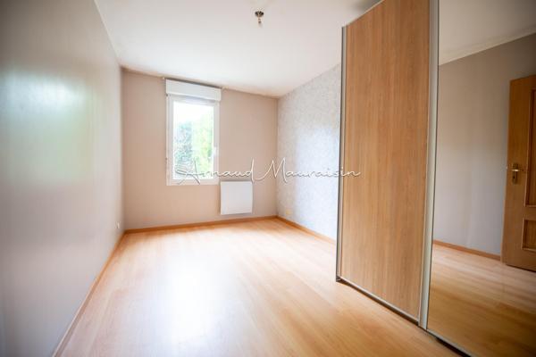 Appartement F3 en rez-de-chaussée avec jardin
