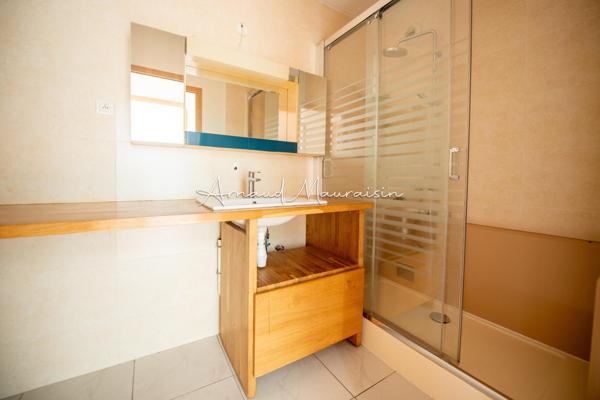 Appartement F3 en rez-de-chaussée avec jardin