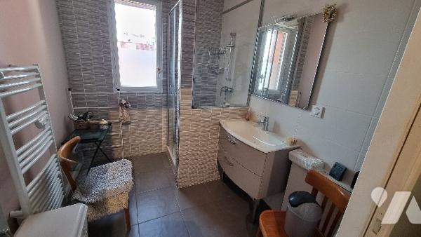 EXCLUSIVITE - APPARTEMENT 3 chambres avec place de parking cave et ascenseur