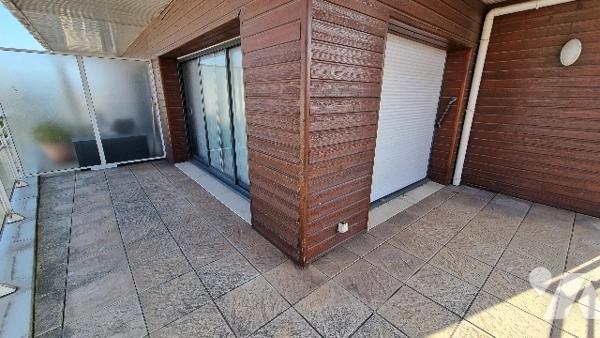EXCLUSIVITE - APPARTEMENT 3 chambres avec place de parking cave et ascenseur