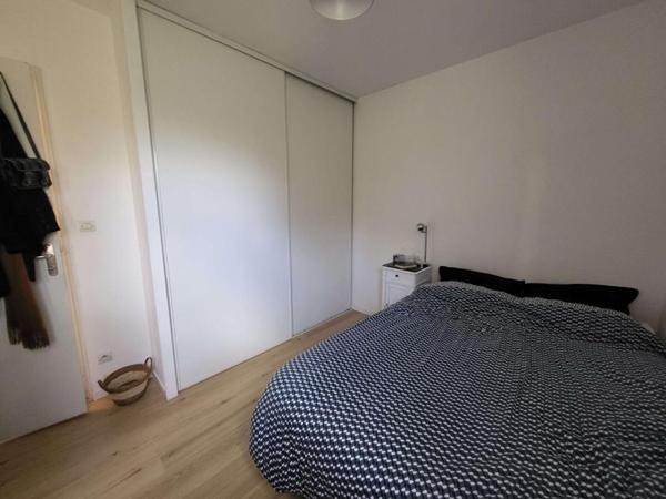 Investissement locatif sécurisé - T2 48 m² avec balcon Ouest, garage et Tram L3 au pied de la résidence