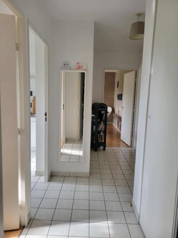 Investissement locatif sécurisé - T2 48 m² avec balcon Ouest, garage et Tram L3 au pied de la résidence