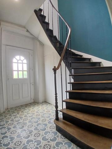 Maison mitoyenne avec terrain