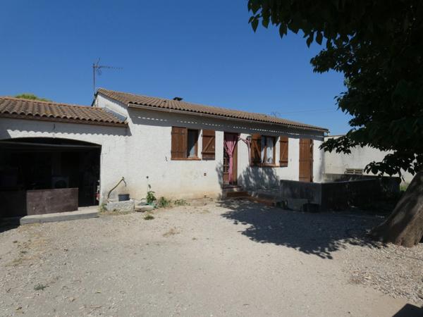 INVESTISSEMENT LOCATIF – Maison 80 m² avec garage et terrain de 429 m² – Locataire en place depuis 2016