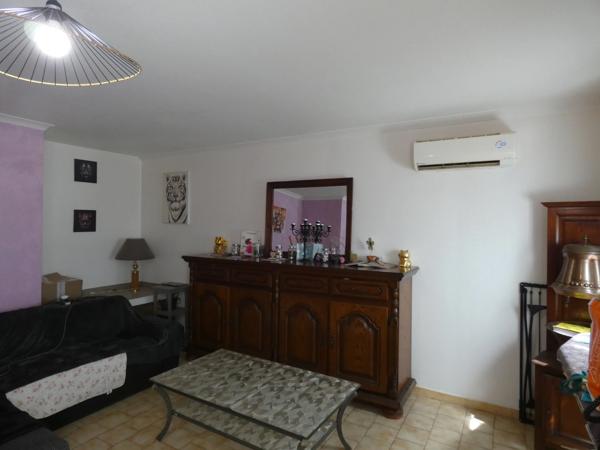 INVESTISSEMENT LOCATIF – Maison 80 m² avec garage et terrain de 429 m² – Locataire en place depuis 2016