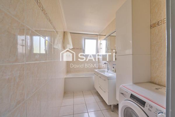 Appartement 4 pièces 3 chambres de 78 m2 avec une place de parking et une cave au sous sol situé à Asnières sur Seine