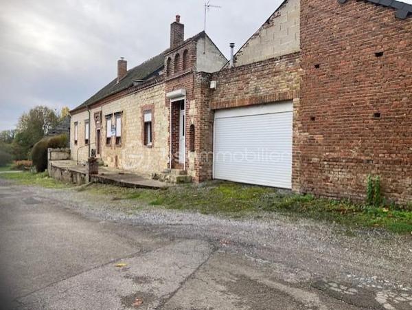 En Exclusivité avec votre agent immobilier Sylvain ORFANI du réseau BSK Immobilier, une maison de 130 m² située dans la charmante commune de Leuze dans l'Aisne.
Ce bien immobilier, niché au cœur d'un village typique de la Thiérache, se divise en deux parties distinctes. 
La première partie de la maison est en grande partie rénovée. Il comprend un vaste salon de 42 m², quatre chambres spacieuses dont deux au rez-de-chaussée et deux à l'étage, avec des surfaces comprises entre 11 et 14 m². La cuisine équipée a un style contemporain. Elle s'accompagne d'une salle de bain également mise au goût du jour. Au sol dans le salon et une chambre il y a un beau carrelage d'époque dans un état impeccable. 
Les travaux de finition à prévoir sont le revêtement de sol au 1er étage et salle de bain et peindre les murs. 
La seconde partie, indépendante, offre une surface de 47 m² (en dehors des 140 m2 de surface habitable )avec une entrée individuelle, idéale pour créer un logement autonome ou pour être rattachée à la partie principale en fonction des projets des futurs propriétaires. Cette seconde partie nécessite une rénovation complète, offrant un réel potentiel pour personnaliser cet espace unique. 

Il y a également un grand garage pour faire un atelier ou lieu de réception en été. 
..................
Exclusively with your real estate agent Sylvain ORFANI of the BSK Immobilier network, a 130 m² house located in the charming town of Leuze in the Aisne department.

This property, nestled in the heart of a typical Thiérache village, is divided into two distinct sections.

The first section of the house is largely renovated. It includes a spacious 42 m² living room, four large bedrooms (two on the ground floor and two upstairs) ranging in size from 11 to 14 m². The fitted kitchen has a contemporary style. It is complemented by a bathroom that has also been updated. The living room and one bedroom feature beautiful period tiles in impeccable condition.

The finishing work required includes flooring on the first floor and in the bathroom, and painting the walls. The second, independent section offers 47 m² of space (in addition to the 140 m² of living space) with its own entrance, ideal for creating a self-contained apartment or for connecting to the main house, depending on the future owners' plans. This second section requires complete renovation, offering real potential for personalizing this unique space.

There is also a large garage suitable for use as a workshop or summer reception area.