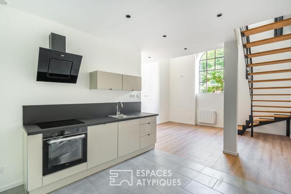 Appartement rénové dans un immeuble en pierres