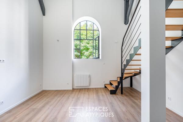 Appartement rénové dans un immeuble en pierres