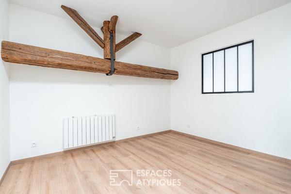 Appartement rénové dans un immeuble en pierres