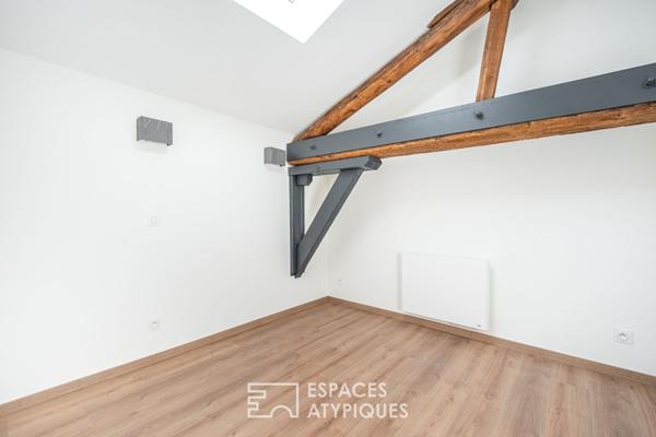 Appartement rénové dans un immeuble en pierres