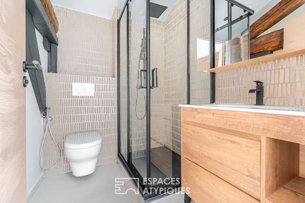 Appartement rénové dans un immeuble en pierres