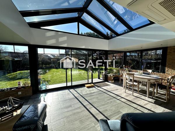 Maison pleine de cachet avec spacieuse véranda.