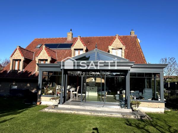 Maison pleine de cachet avec spacieuse véranda.