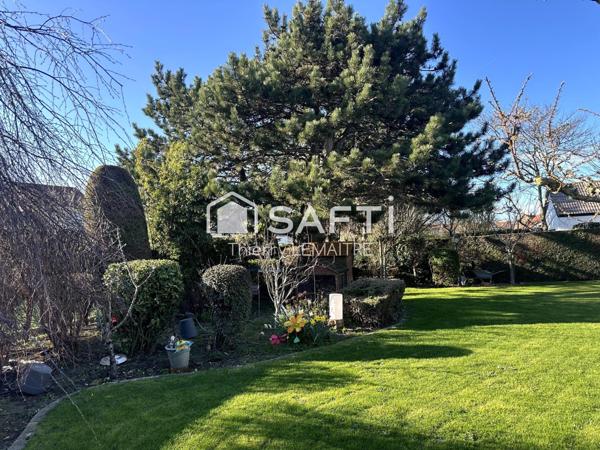 Maison pleine de cachet avec spacieuse véranda.