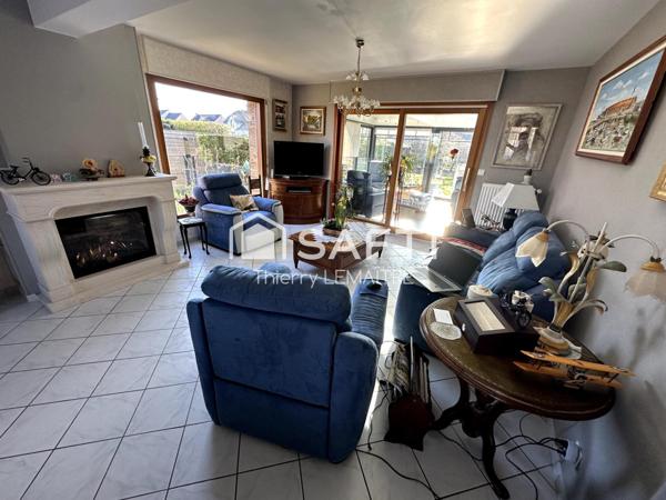 Maison pleine de cachet avec spacieuse véranda.