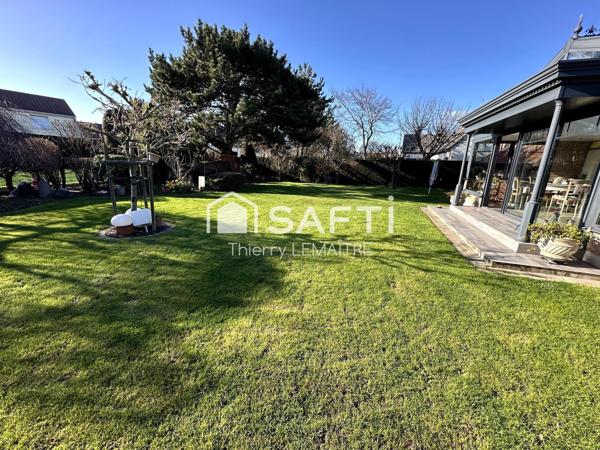 Maison pleine de cachet avec spacieuse véranda.