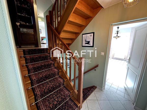 Maison pleine de cachet avec spacieuse véranda.