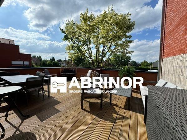 Appartement de Type 3 avec grande terrasse et place de parking en sous-sol. WATTIGNIES