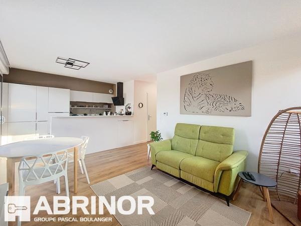Appartement de Type 3 avec grande terrasse et place de parking en sous-sol. WATTIGNIES