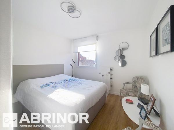 Appartement de Type 3 avec grande terrasse et place de parking en sous-sol. WATTIGNIES