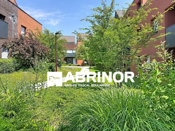 Appartement de Type 3 avec grande terrasse et place de parking en sous-sol. WATTIGNIES