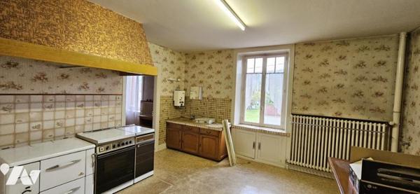 Lot de 2 logements avec dépendances et terrain