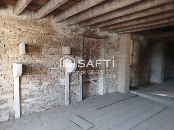 Maison avec terrain est grange et cave