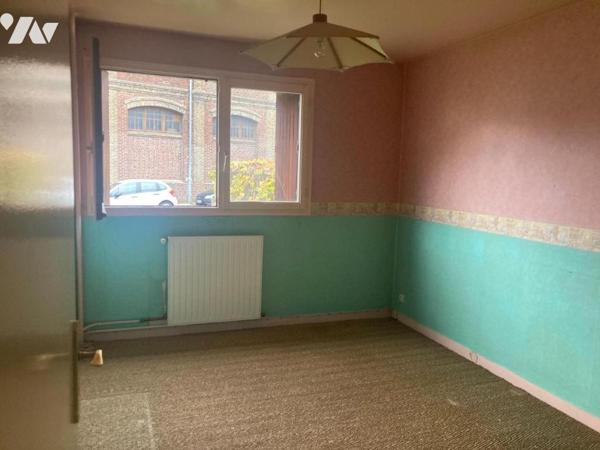 APPARTEMENT 2 CHAMBRES + GARAGES