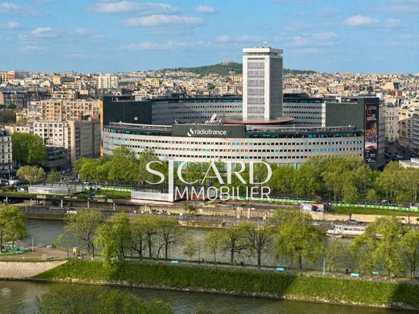 Appartement rénové, étage élevé, vue Seine - Paris 15