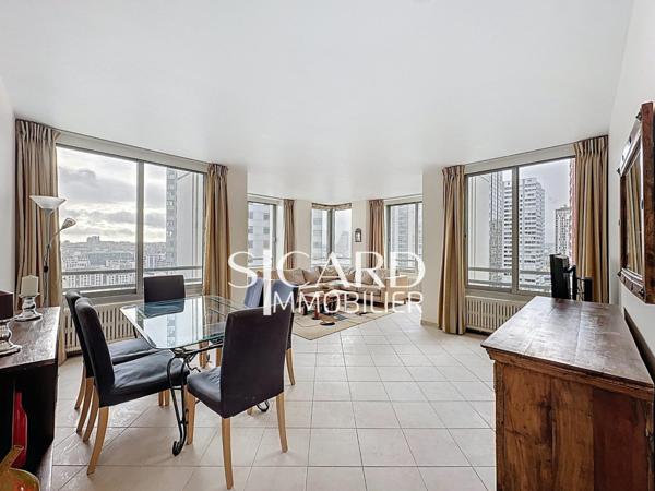 Appartement rénové, étage élevé, vue Seine - Paris 15