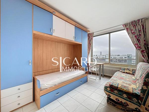 Appartement rénové, étage élevé, vue Seine - Paris 15