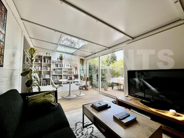 Maison lumineuse avec jardin, véranda et garage – un petit coin de paradis au calme