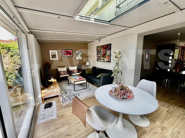 Maison lumineuse avec jardin, véranda et garage – un petit coin de paradis au calme