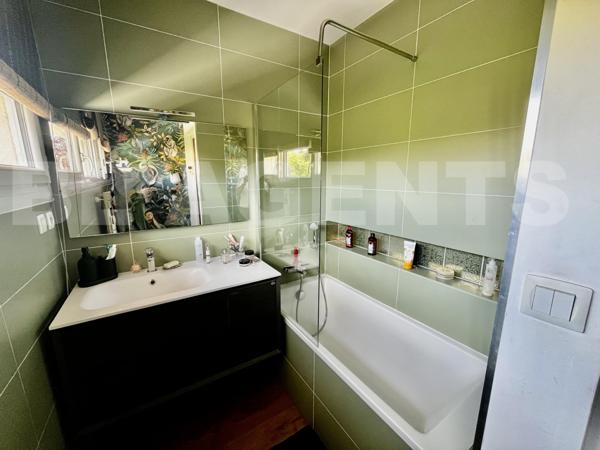 Maison lumineuse avec jardin, véranda et garage – un petit coin de paradis au calme