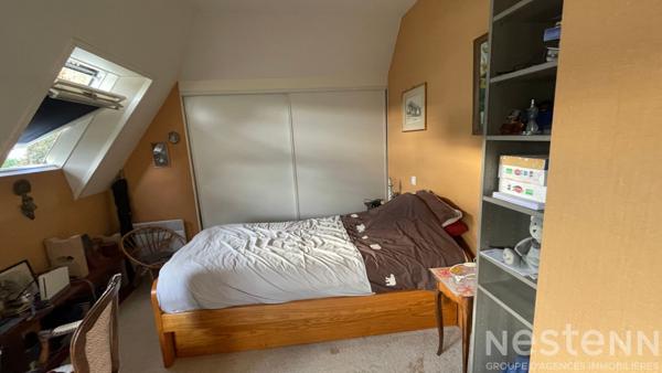 Confort et emplacement ideal : grand T4 avec terrasse ensoleillee, garage et cave a Auray