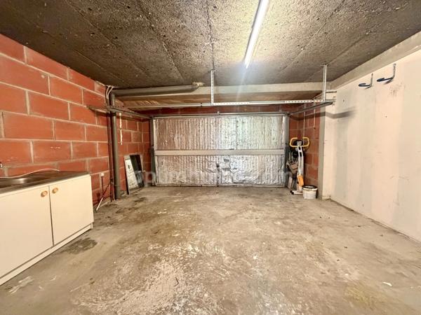 Maison 4 chambres + double garage + parking