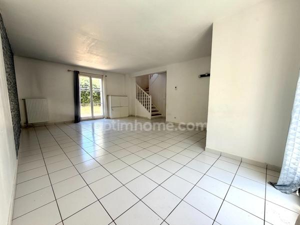 Maison 4 chambres + double garage + parking