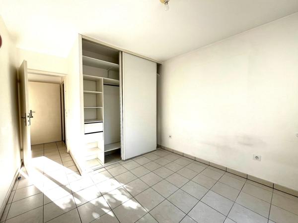 Appartement 3 pièces avec terrasse, jardin et deux places de parking