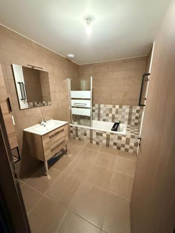 EXCLUSIVITE Appartement T2 Duplex avec terrasse, jardin, garage et place de parking privative